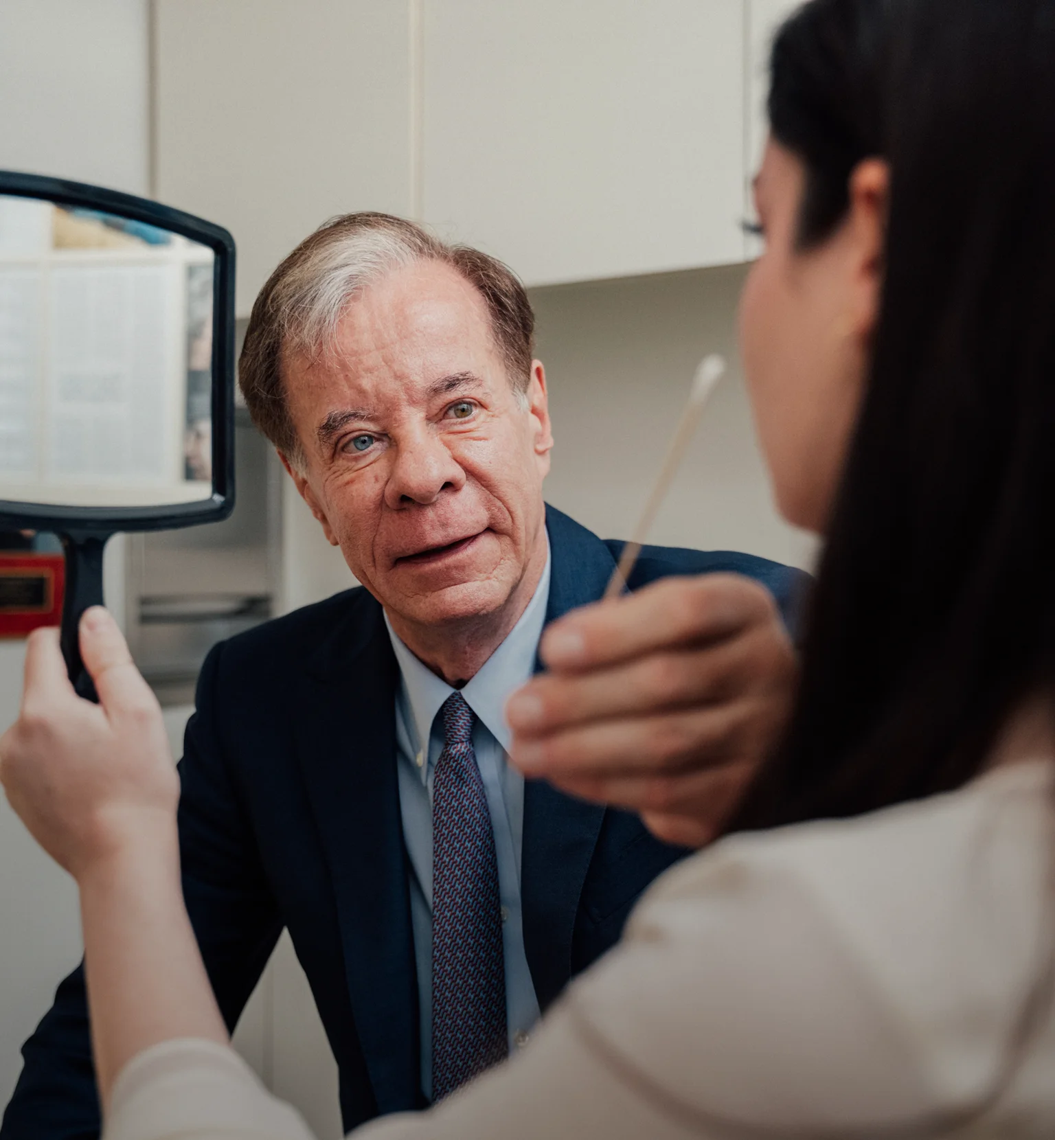 Dr Antell in discussion with colleague during office meeting consultation - Facelift in New York, NY