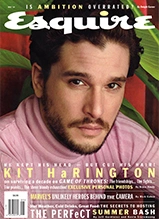 Kit Harington on Esquire magazine cover wearing pink sweater against red and green background