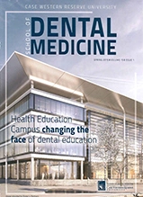 Dental Medicine magazine cover featuring modern building and headline about changing dental education