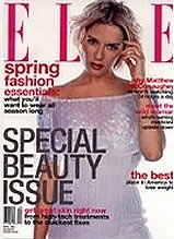 Elle magazine spring fashion special beauty issue cover featuring model in white off-shoulder top