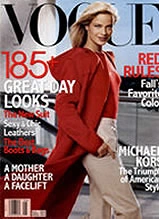 Vogue magazine cover featuring model in red blazer with headlines about birthday looks and fashion tips