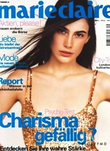 Marie Claire magazine cover featuring Charisma Carpenter with long dark hair and gold sequined top