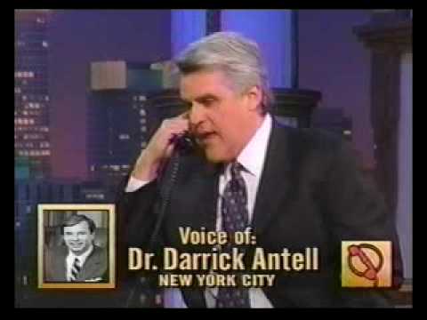 Dr. Darrick Antell appearing as voice expert on television talk show with NYC skyline backdrop